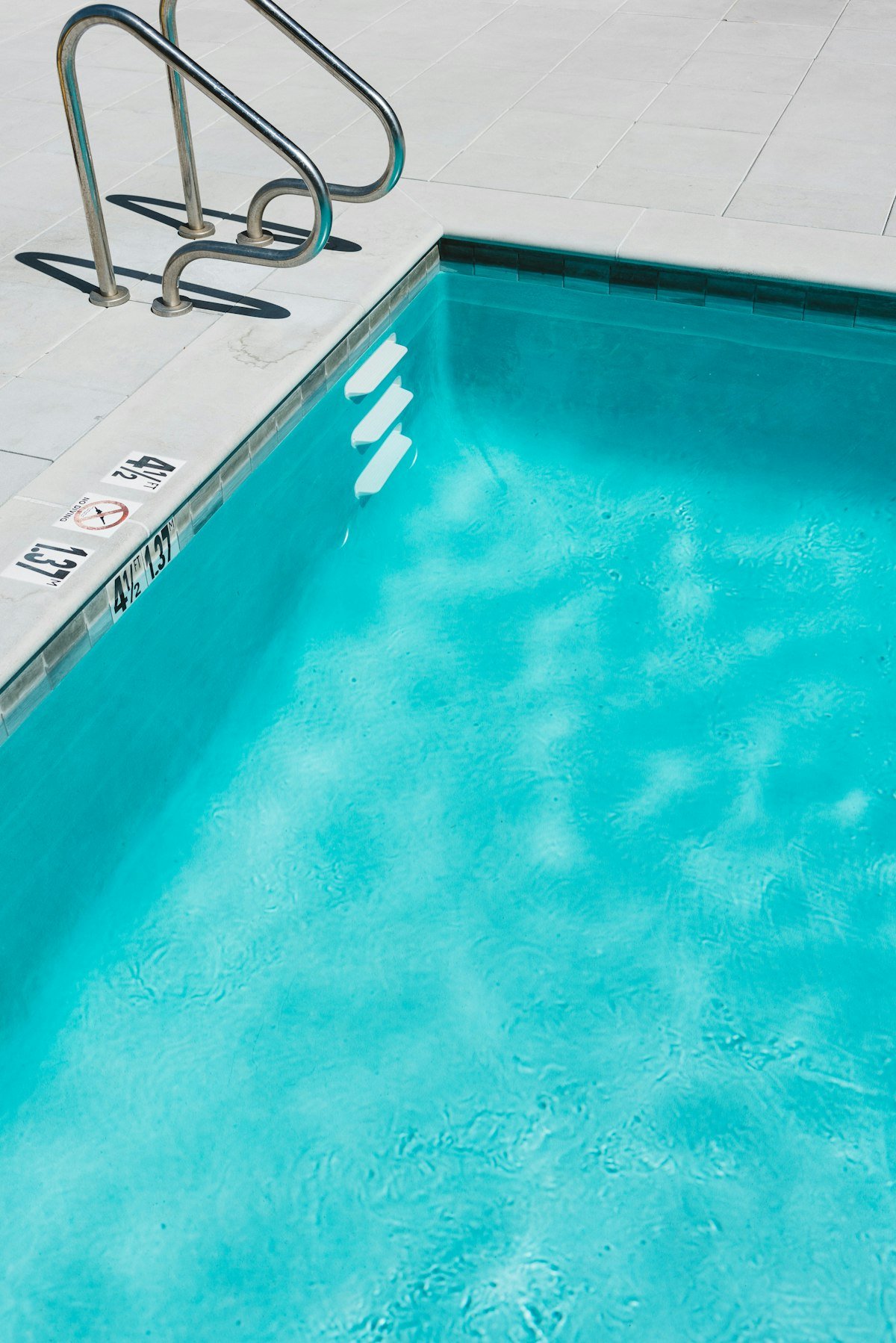 Bright blue pool water after an acid wash in Houston