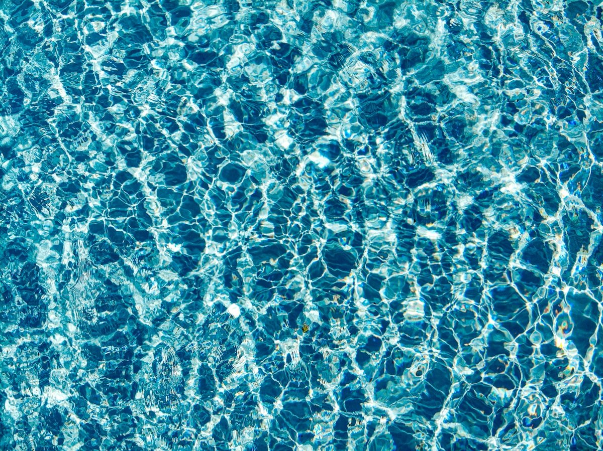 Weekly pool maintenance keeping Houston pool water crystal clear